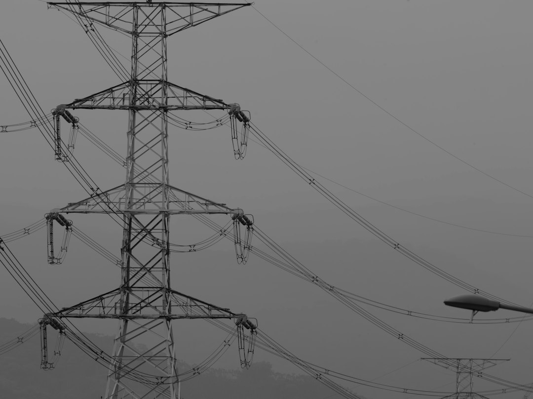 Photo ufo behind utility pole occlusion